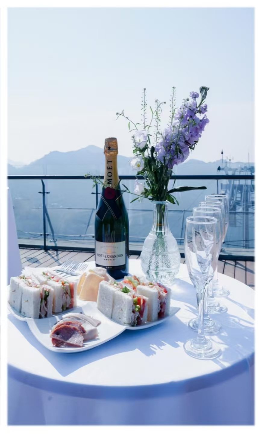 Champagne and canapés with mountain views